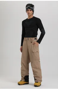 Detail view of men's winter cargo ski pants, waterproof windproof straight outdoor snow trousers.