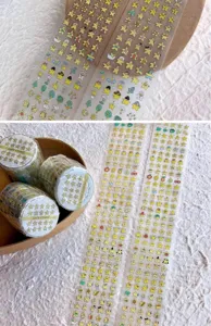 Detailed close-up view of cute star washi tape rolls and PET clear tape strips with lovely icons.