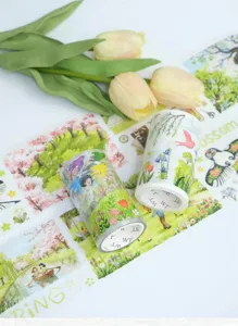 Decorative washi tape featuring lovely spring scenery, flowers, and birds for journaling crafts.