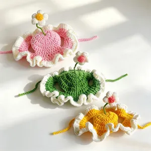 Handcrafted crochet pet hat detail, cute flower design with ear holes for cats and dogs.
