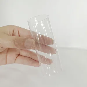 Clear plastic washi tape storage tube, transparent cylindrical packaging display container for tape.