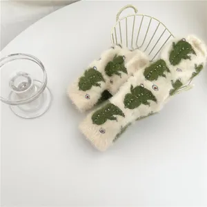 Thickened cute animal fuzzy coral fleece mid-calf socks for warm home sleeping and daily wear.