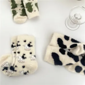 Plush fuzzy cute animal pattern warm mid-tube socks detail view for cozy home winter wear.