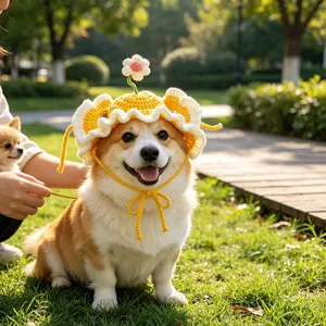 Handmade crochet pet hat detail featuring cute yellow flower design and ruffles for cats and dogs.