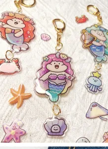 Leuke zeemeermin acryl sleutelhanger set met schattige oceaan bedels voor tassen.