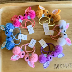Colorful plush rabbit hair ties for kids, cute fluffy bunny hair ropes and elastic pony tail holders.