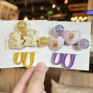 Chouchous mignons ours coeur dessin animé pour enfants, cordes à cheveux colorées style crème.