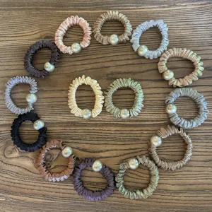 Satin hair scrunchies with elegant pearls, elastic gradient hair ties for women and girls.