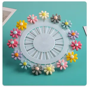 Colorful resin flower long pin brooch detail showing various multi-color floral dress accessories.