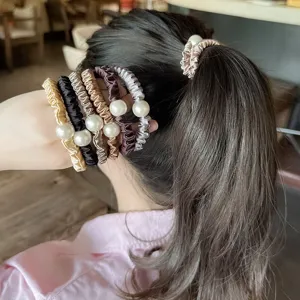 Satin pearl hair scrunchies set, elegant elastic hair ties for women ponytail and buns styling.