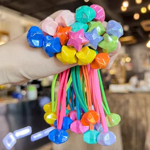 Colorful star hair ties detail shot, vibrant multi-color beads with elastic ropes.