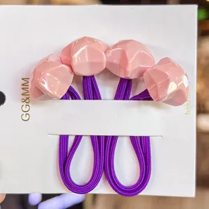 Pink faceted star hair ties with purple elastic bands, cute cartoon hair accessories for girls.