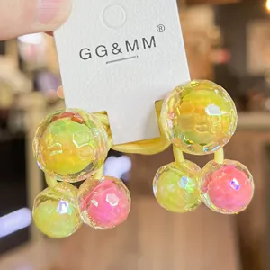 Children's colorful disco bead hair tie with translucent faceted balls and elastic band.