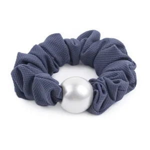 Detailed close-up of a dark grey scrunchie featuring a large smooth pearl ornament.