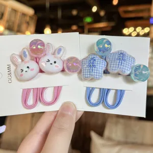 Jolis élastiques à cheveux de style crème de dessin animé avec pendentifs lapin pour enfants.