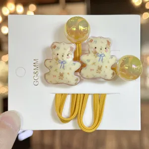 Élastiques à cheveux mignons ours floral avec perles jaunes transparentes pour enfants.