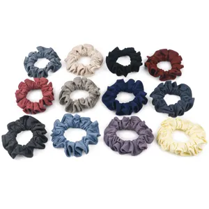 Detailed view of assorted colored honeycomb ice silk hair scrunchies, elastic hair ties.