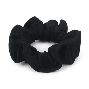 Minimalist black honeycomb ice silk hair scrunchie, elastic pleated hair rope accessory.