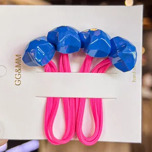 Blue faceted star hair ties with pink elastic bands on card for cute girls hair accessories