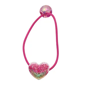 Joli élastique à cheveux pour enfants avec pendentif cœur pailleté, accessoire de coiffure rose.