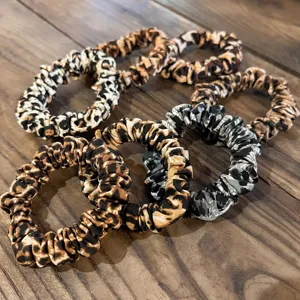 Leopard print hair scrunchies set, soft fabric elastic hair ties for women and girls styling.