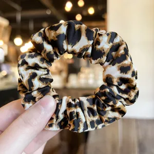 Leopard print hair scrunchie for women, stylish elastic hair band fashion hair accessories.