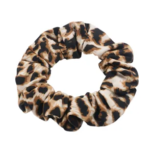 Chic leopard print hair scrunchie for women, stylish elastic hair band for daily casual styling.