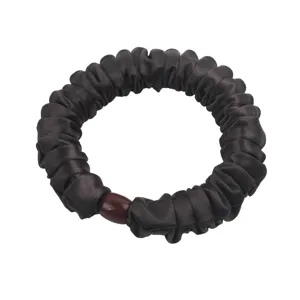 Dark brown satin scrunchie with bead decoration, elegant elastic hair tie for women ponytail.