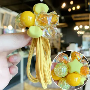 Joli élastique à cheveux jaune pour enfants avec perles de cristal et corde élastique.