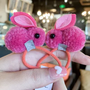 Cute pink plush rabbit hair tie for kids, soft pom pom hair elastic rubber band pony tail holder.