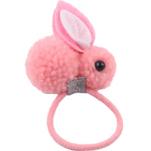 Cute pink plush bunny hair tie for kids, soft fluffy rabbit hair rope daily styling.