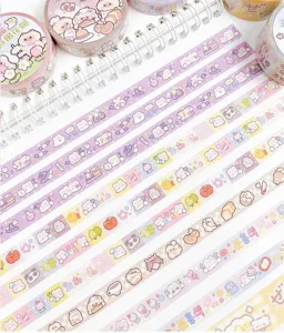 Detailed view of cute washi tape with border patterns like bunnies and puddings for journals.