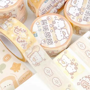 Cute washi tape rolls set with adorable cartoon animal and food patterns for scrapbooking.