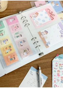 A5 loose-leaf sticker storage book binder with cute illustration memo pads and cards for journaling.