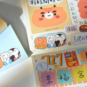 Cute memo pad detail shot showing colorful creative sticky notes and hand-drawn stationery art.