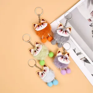 Colorful plush animal keychain with fluffy pom pom charm, cute cartoon bag pendant decor.