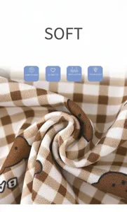 Kids summer pajama fabric detail, soft breathable plaid cotton material for children.