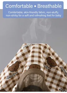 Kids summer breathable plaid pajama detail shot featuring cute bear pattern and soft fabric.