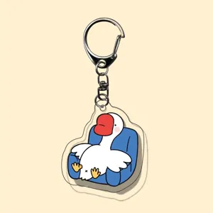 Acrylic cartoon duck keychain, cute transparent animal pendant for backpack bag decor.