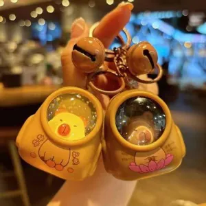 Lindo oso de dibujos animados mochila llavero luz nocturna brillante bolso colgante.