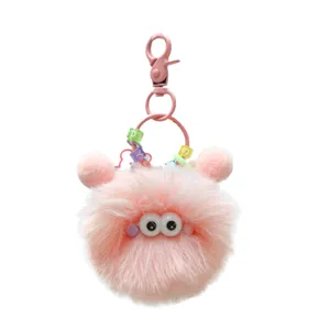 Süßer rosa flauschiger Plüsch Schlüsselanhänger mit großen Wackelaugen und Metallverschluss.