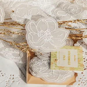 Detail shot of white tea series sulfuric acid paper flowers, translucent floral stickers.