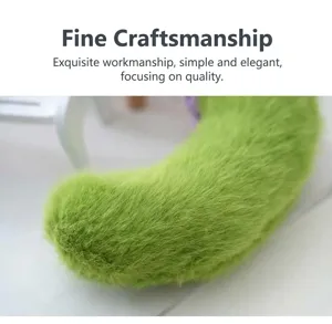 Cute plush cucumber keychain vegetable bag pendant soft stuffed toy closeup view