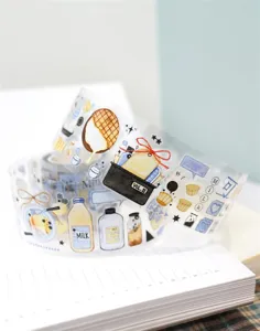 Cute PET washi tape detail shot featuring milk bottle and toast illustrations for journaling.