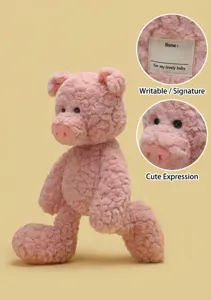 Cute pink plush pig detail view featuring curly fur, cute face and a writable name tag.
