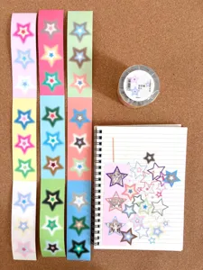 Gradient star washi tape rolls and cute cartoon journal stickers for diy craft decoration.