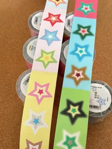 Detail view of colorful star sticker rolls, perfect for journaling and DIY crafts decoration.
