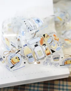 PET die-cut washi tape detail showing cute milk and dessert illustrations for journaling.