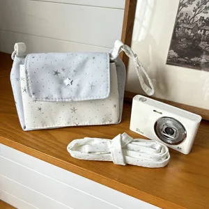 Stylish star pattern crossbody camera bag, cute multi-layer shoulder bag for daily travel.