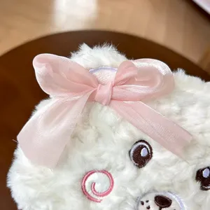 Cute white plush pencil case with pink chiffon bow, soft fluffy stationery storage bag for students.